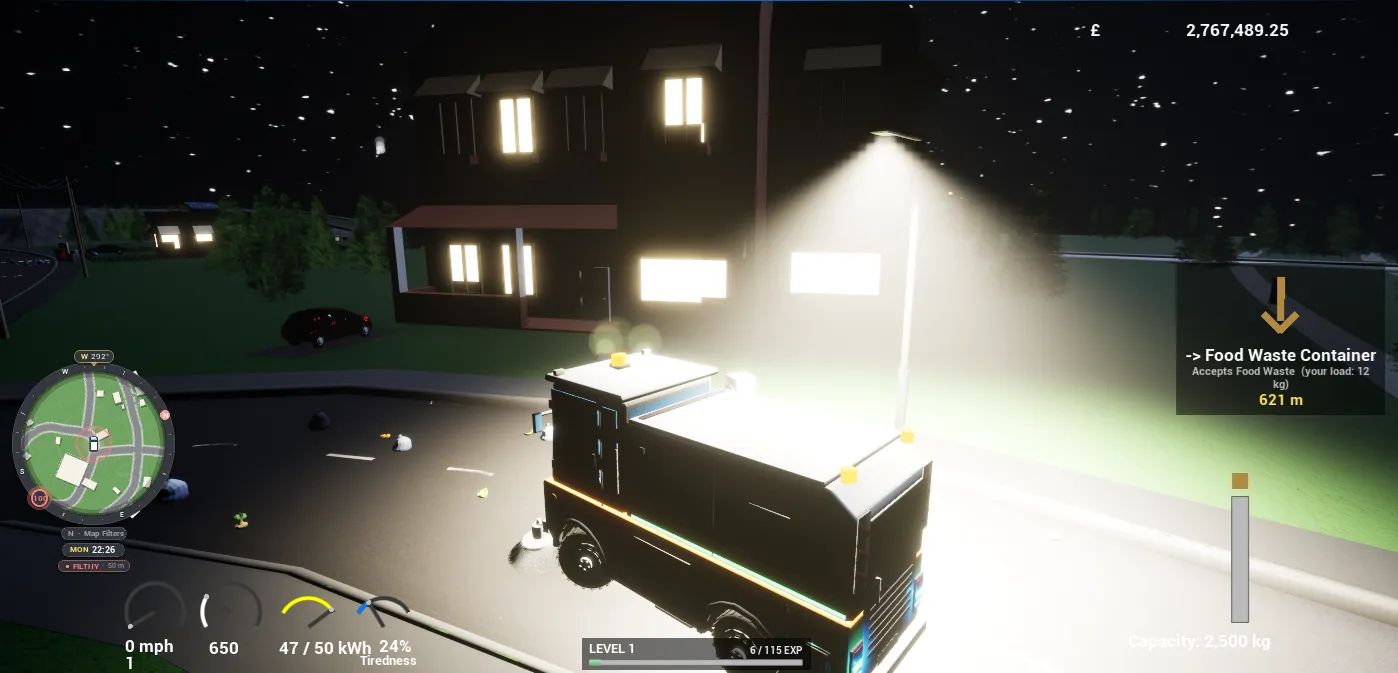 A street sweeper lit by street lamps on a night-time road.